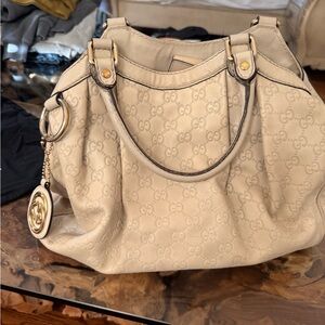 Authentic Gucci cream leather bag